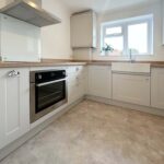 Halton Property Service; organised Dove Grey kitchen