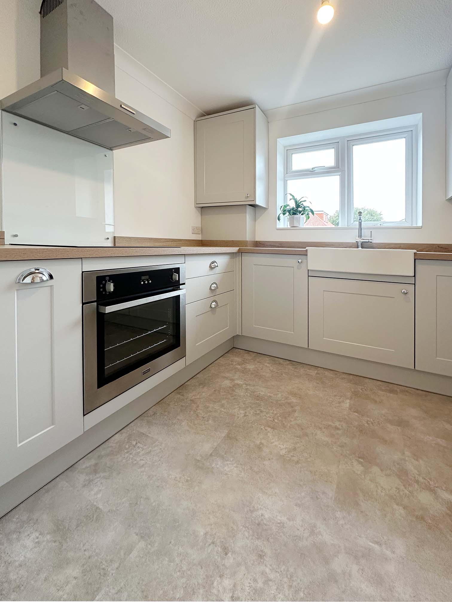 Halton Property Service; organised Dove Grey kitchen