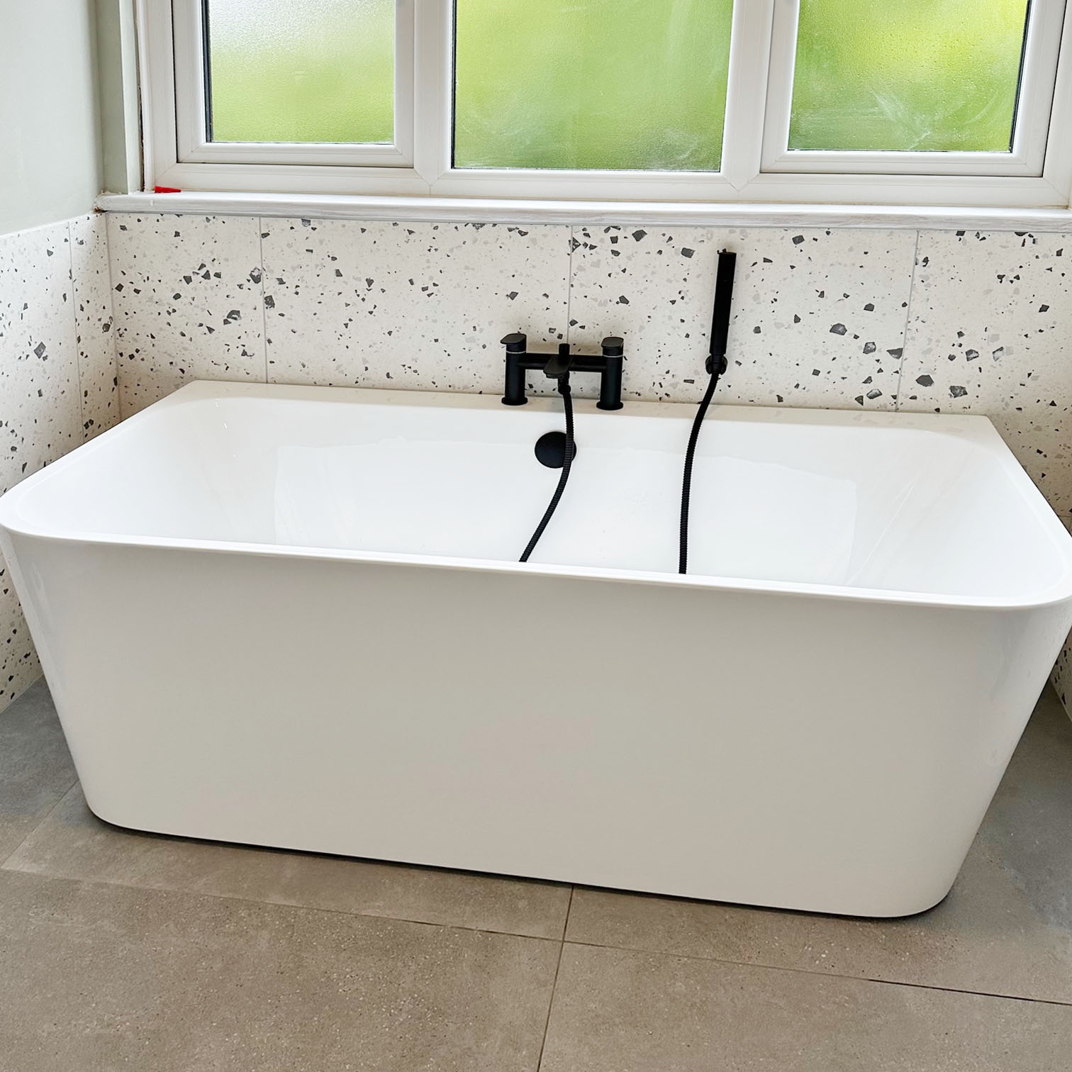 Halton Property Service; Back-to-wall Freestanding Bath