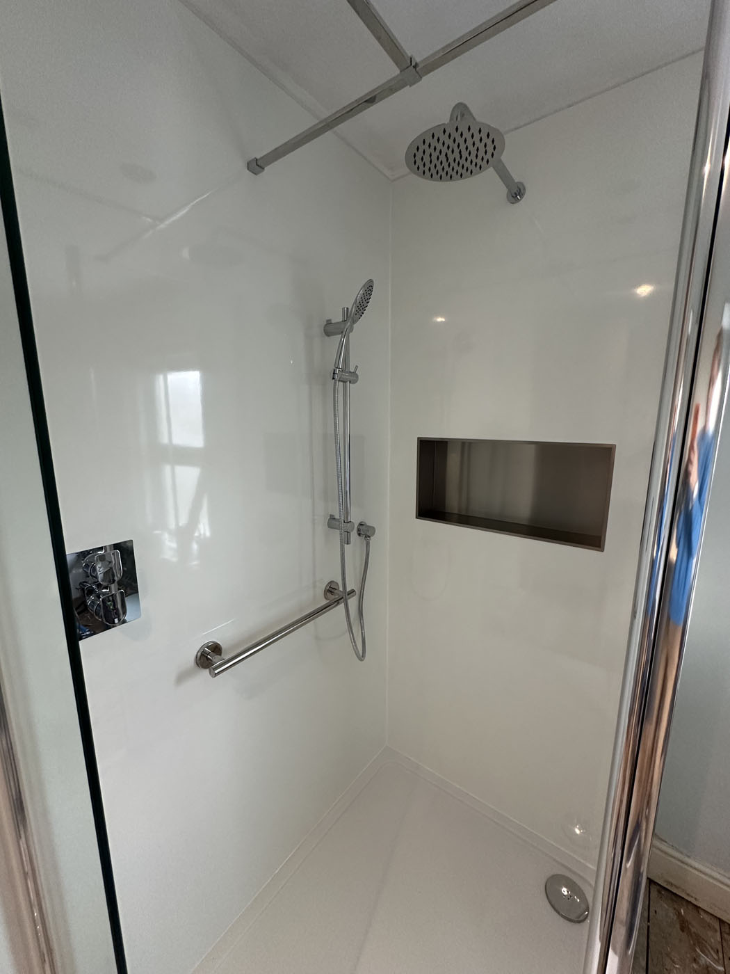 Halton Property Services; Sink, Illuminated Mirror and Shower Panel surround
