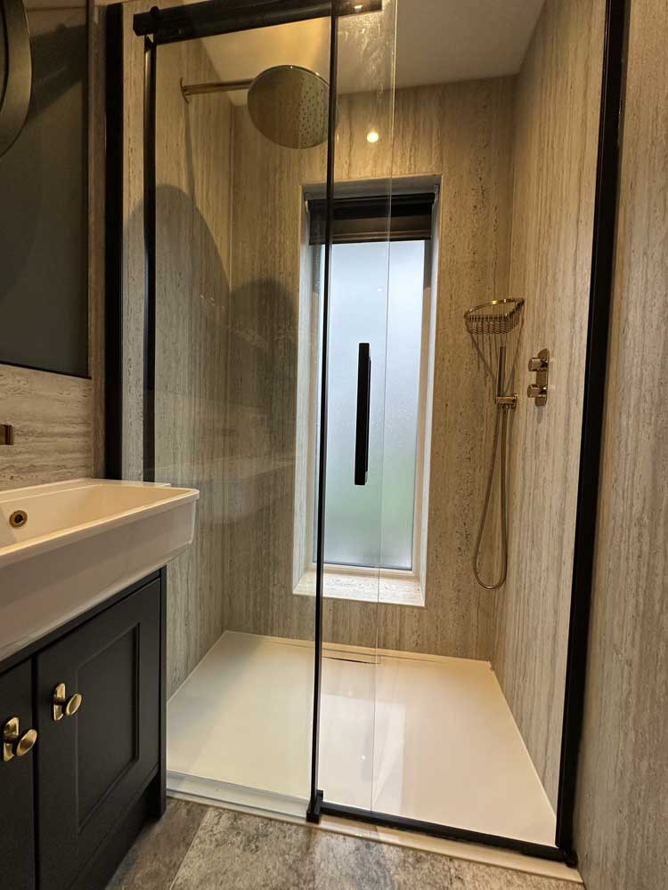 Halton Property Service; Modern Downstairs Cloakroom with Shower Installation in Barton on Sea